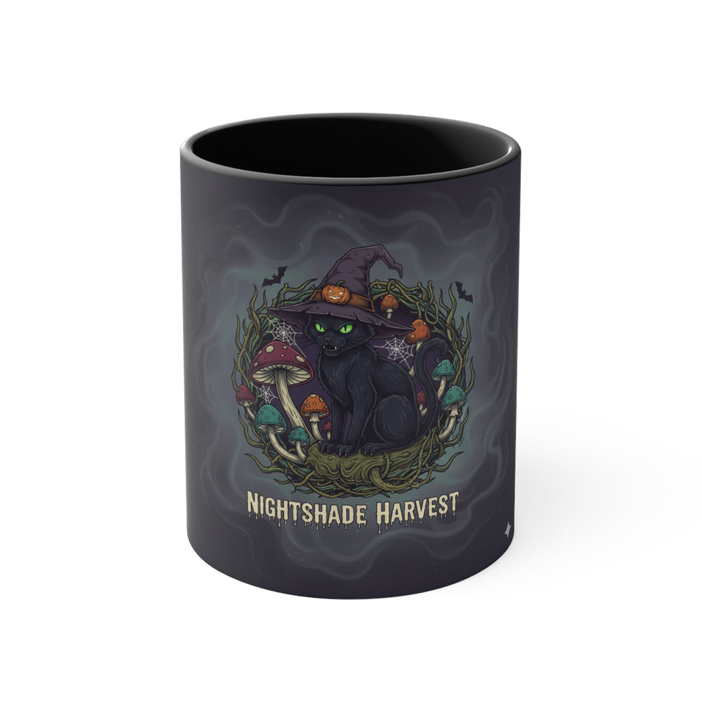 Nightshade Harvest Cat Mug front view with black interior – green-eyed black cat in witch hat